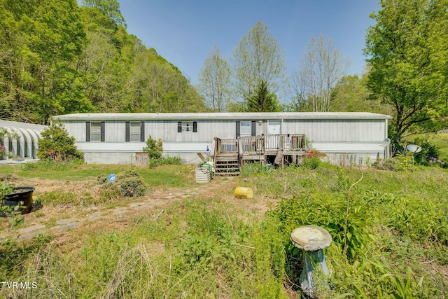 120 Bear Hollow Rd, Bristol, TN 37620 - back of property with a wooden deck