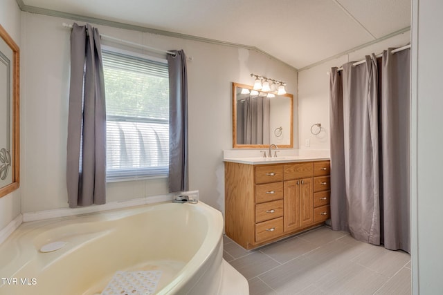 120 Bear Hollow Rd, Bristol, TN 37620 - full bathroom featuring vanity, tile patterned flooring, a bath, and lofted ceiling