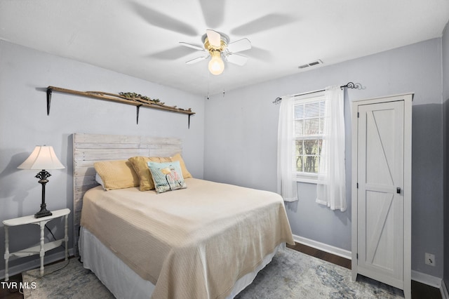 4245 Maplewood St, Kingsport, TN 37660 - bedroom with wood finished floors, baseboards, ceiling fan, and visible vents