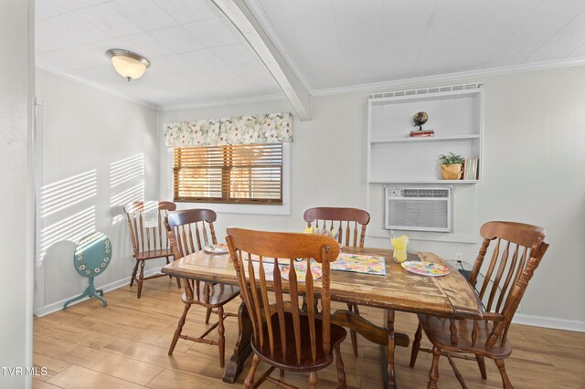 4245 Maplewood St, Kingsport, TN 37660 - dining space featuring an AC wall unit, light wood finished floors, and crown molding