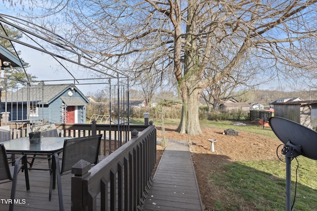 4245 Maplewood St, Kingsport, TN 37660 - wooden terrace featuring outdoor dining area, an outdoor structure, and fence