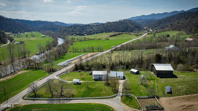 aerial view featuring a mountain view and a rural view