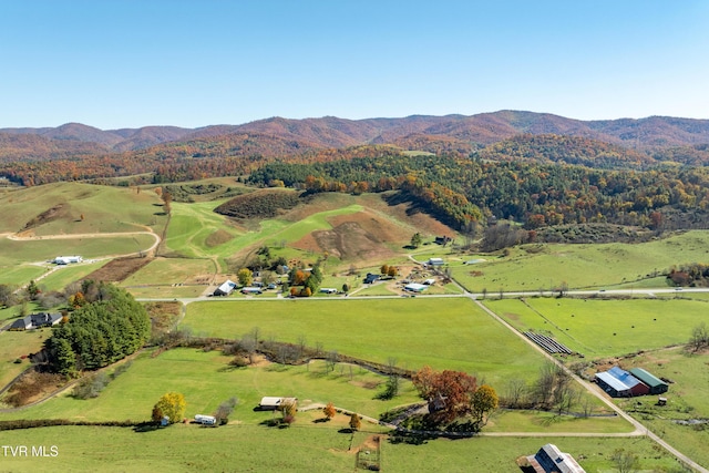 bird's eye view with a mountain view and a rural view