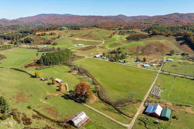 bird's eye view with a rural view and a mountain view