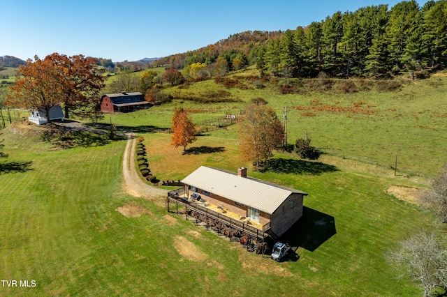 aerial view featuring a mountain view and a rural view