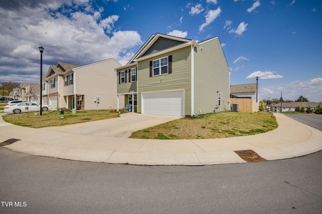 1205 Stamp Lodge Rd, Kingsport, TN 37660 - view of front of property with an attached garage, board and batten siding, and concrete driveway