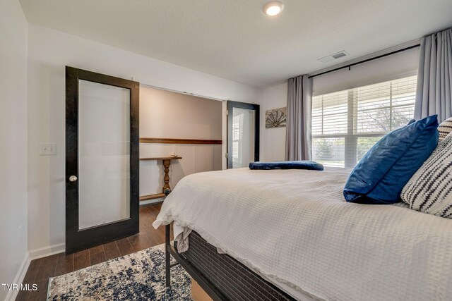 1205 Stamp Lodge Rd, Kingsport, TN 37660 - bedroom featuring visible vents and dark wood-type flooring