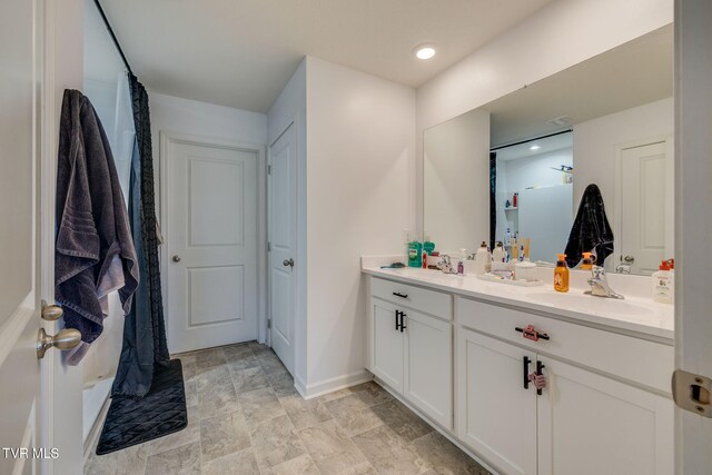 1205 Stamp Lodge Rd, Kingsport, TN 37660 - bathroom with a shower with curtain, double vanity, and a sink