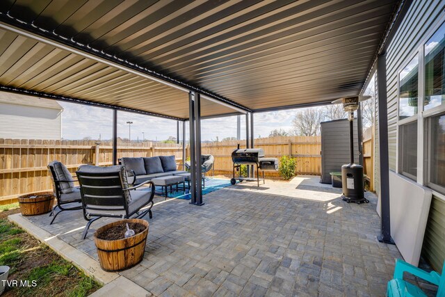 1205 Stamp Lodge Rd, Kingsport, TN 37660 - view of patio / terrace with area for grilling, fence, and an outdoor living space