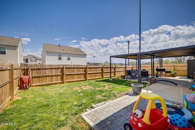 1205 Stamp Lodge Rd, Kingsport, TN 37660 - view of yard with a fenced backyard and a patio