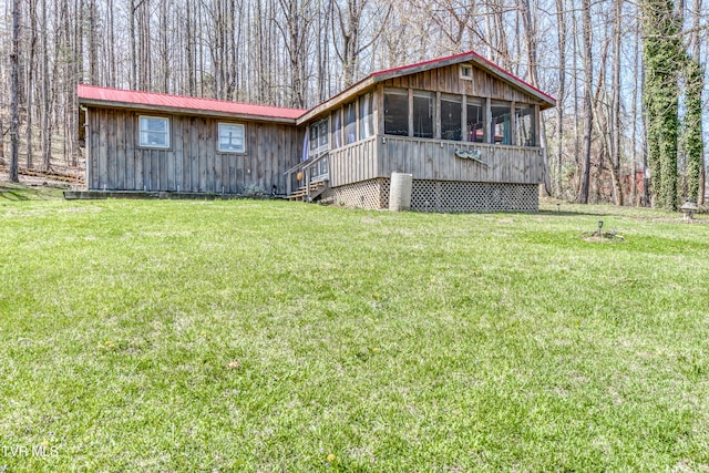 23324 Denton Valley Rd, Abingdon, VA 24211 - exterior space with a sunroom, metal roof, board and batten siding, and a yard
