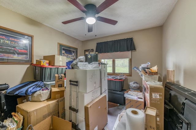 storage room with a ceiling fan