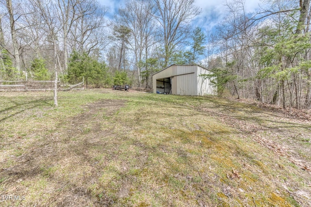 view of yard with an outbuilding and an outdoor structure