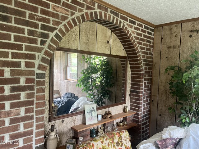 4235 Kiser Rd, Coeburn, VA 24230 - detailed view of wooden walls, a textured ceiling, and arched walkways