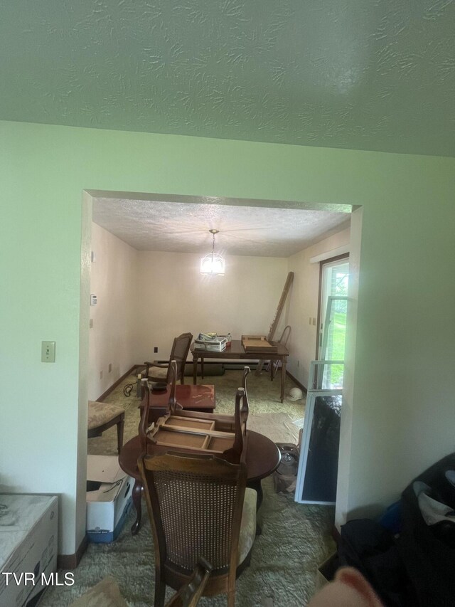 4235 Kiser Rd, Coeburn, VA 24230 - dining area with a textured ceiling and baseboards