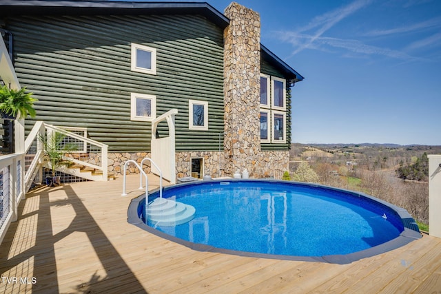 pool with a wooden deck