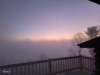 view of deck at dusk