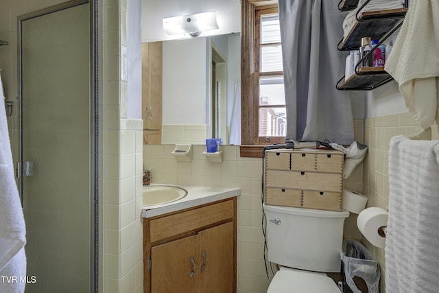 216 Nelson Ave, Piney Flats, TN 37686 - bathroom featuring a stall shower and tile walls