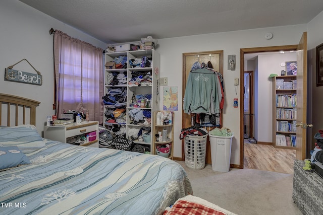 216 Nelson Ave, Piney Flats, TN 37686 - bedroom featuring carpet floors and a textured ceiling