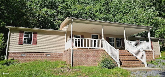 131 Pheasant Hollow Ln, Johnson City, TN 37601 - view of front of property featuring covered porch, crawl space, and stairs