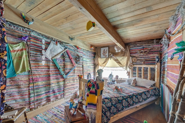 bedroom featuring wood finished floors, log walls, beam ceiling, and wooden ceiling