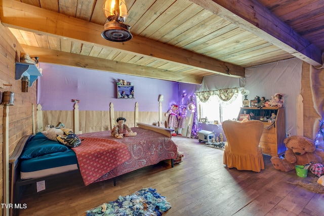 bedroom featuring hardwood / wood-style floors, wood ceiling, and beam ceiling