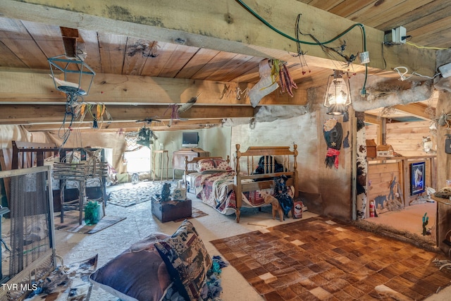 unfurnished bedroom featuring wooden ceiling and beam ceiling