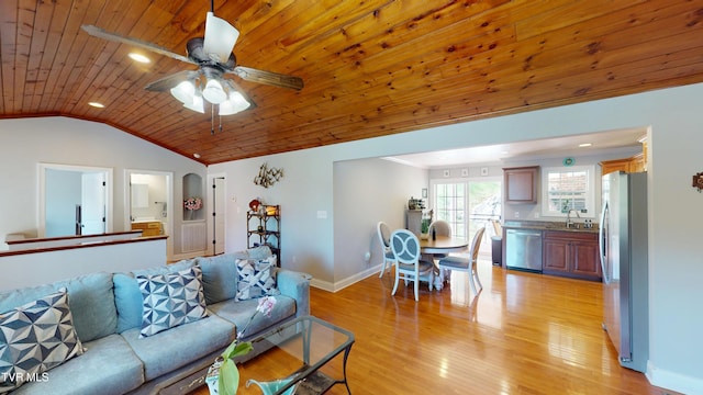 93 Bridgewater Ct Unit 93, Johnson City, TN 37615 - living area featuring light wood-style flooring, ceiling fan, baseboards, and lofted ceiling