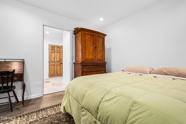 403 Deerlick Rd, Piney Flats, TN 37686 - bedroom with baseboards, wood finished floors, and recessed lighting