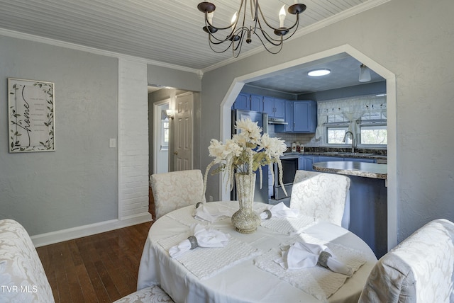5744 Orebank Rd, Kingsport, TN 37664 - dining area with baseboards, ornamental molding, a chandelier, a textured wall, and dark wood finished floors