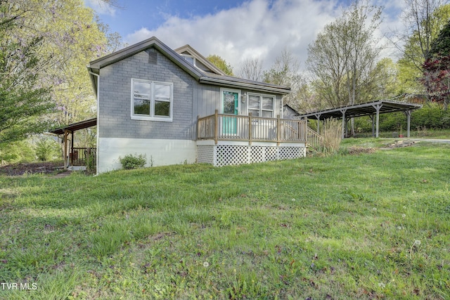 5744 Orebank Rd, Kingsport, TN 37664 - view of front of house with a detached carport, a wooden deck, and a front lawn