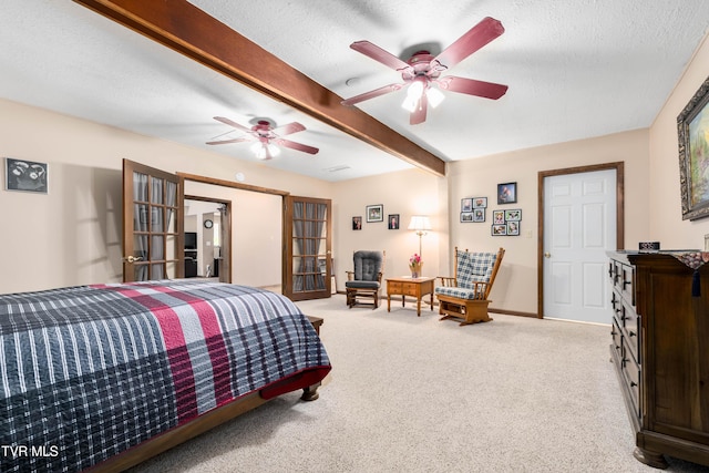 166 Lonesome Dove Ln, Elizabethton, TN 37643 - bedroom with baseboards, a textured ceiling, beamed ceiling, french doors, and light carpet