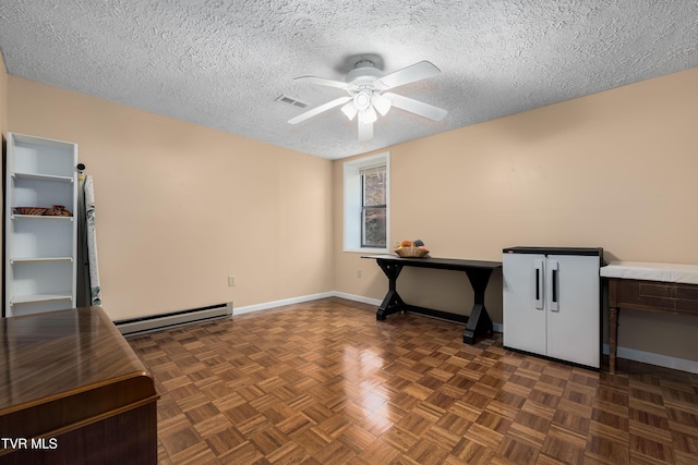 166 Lonesome Dove Ln, Elizabethton, TN 37643 - office with a textured ceiling, a baseboard heating unit, ceiling fan, and visible vents