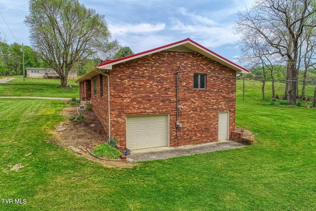 view of home's exterior with driveway, a yard, brick siding, and a garage