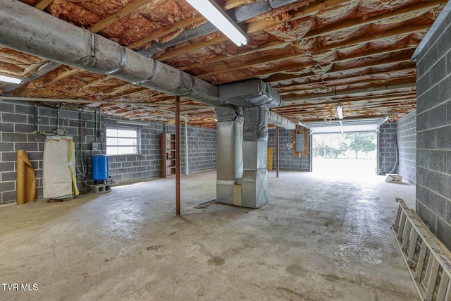 basement featuring heating unit