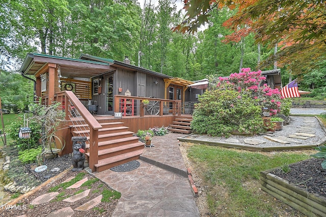 521 Baywood Dr, Piney Flats, TN 37686 - view of front facade with stairs and board and batten siding