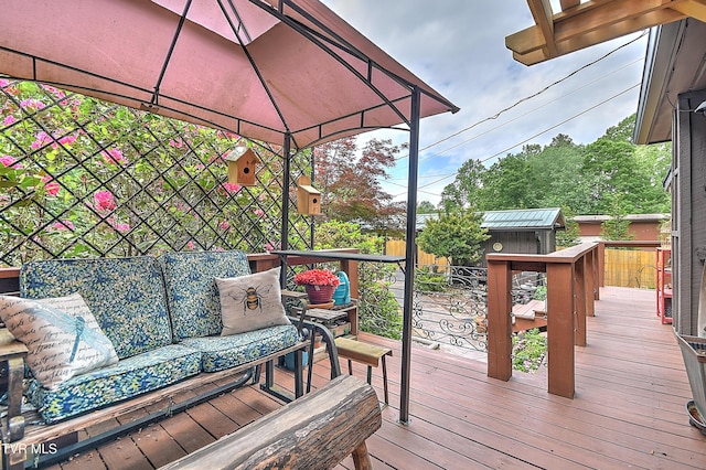 521 Baywood Dr, Piney Flats, TN 37686 - wooden terrace with a storage unit, outdoor lounge area, an outbuilding, and a gazebo