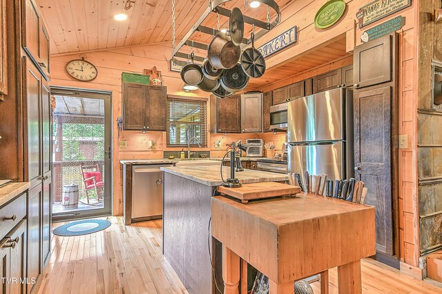 521 Baywood Dr, Piney Flats, TN 37686 - kitchen featuring stainless steel appliances, wood ceiling, light wood-style floors, plenty of natural light, and vaulted ceiling