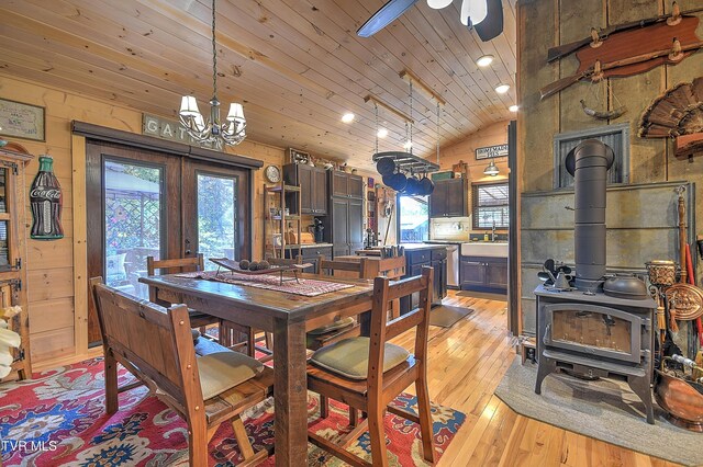 521 Baywood Dr, Piney Flats, TN 37686 - dining room with wood ceiling, a wood stove, vaulted ceiling, french doors, and light wood-style flooring