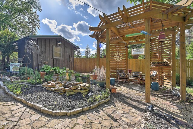 521 Baywood Dr, Piney Flats, TN 37686 - view of yard with a pergola, fence, an outbuilding, and an outdoor fire pit