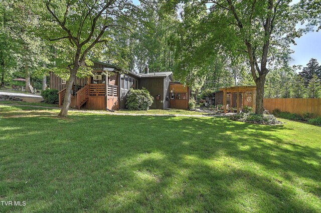 521 Baywood Dr, Piney Flats, TN 37686 - view of yard with stairway, a wooden deck, and an outbuilding