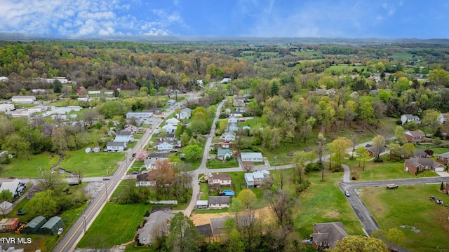 bird's eye view with a forest view and a residential view