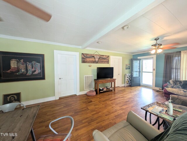 2509 Dc Caney Ridge Rd, Clintwood, VA 24228 - living room featuring baseboards, a ceiling fan, crown molding, visible vents, and wood finished floors