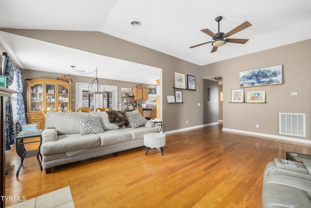 253 Crockett Dr Unit 253, Church Hill, TN 37642 - living area with visible vents, light wood-type flooring, a ceiling fan, and baseboards