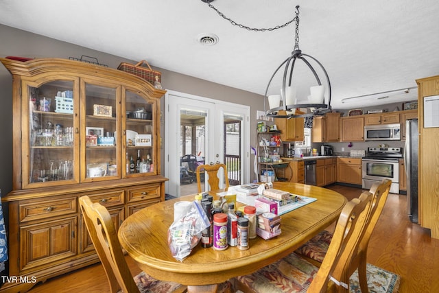 253 Crockett Dr Unit 253, Church Hill, TN 37642 - dining area featuring french doors, light wood finished floors, and visible vents