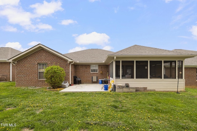 253 Crockett Dr Unit 253, Church Hill, TN 37642 - rear view of property featuring a sunroom, a yard, a patio, brick siding, and a shingled roof