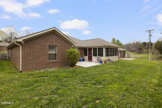 253 Crockett Dr Unit 253, Church Hill, TN 37642 - rear view of house featuring a patio area, a yard, and a sunroom