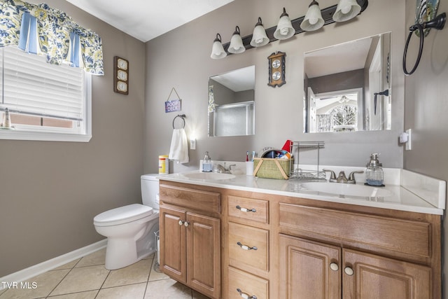 253 Crockett Dr Unit 253, Church Hill, TN 37642 - bathroom featuring toilet, double vanity, a sink, and tile patterned flooring