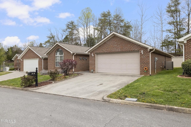 253 Crockett Dr Unit 253, Church Hill, TN 37642 - ranch-style home with driveway, cooling unit, a front lawn, brick siding, and a garage