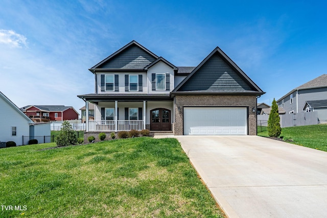 1177 Lemongrass Dr, Jonesborough, TN 37659 - view of front of house featuring covered porch, a front yard, fence, a garage, and driveway